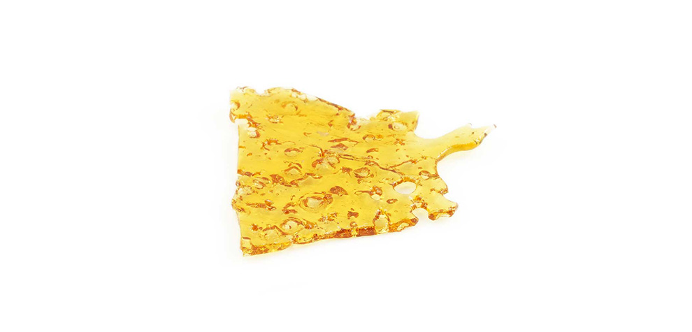 Sour diesel shatter weed from mail order weed shop and online dispensary Canada MMJ Express. Best Sativa strains of shatter.