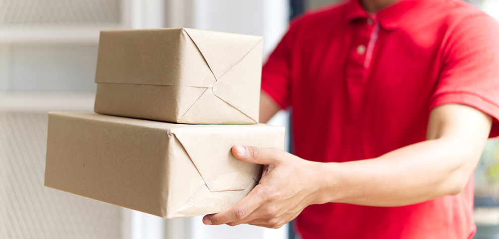 Delivery man with weed delivery in Canada from online dispensary for mail order marijuana.