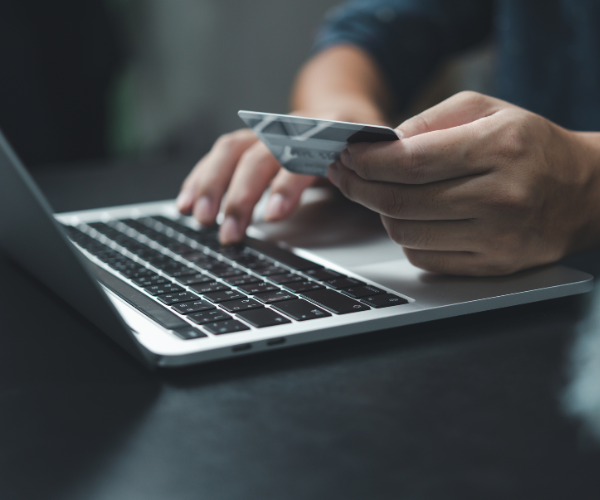 Person buying weed on an online dispensary, symbolizing the ease and convenience of purchasing premium weed online
