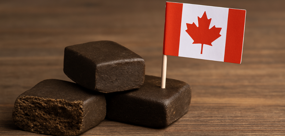Stack of premium cannabis hash blocks with a Canadian flag, symbolizing a comparison of the best hash available online in Canada