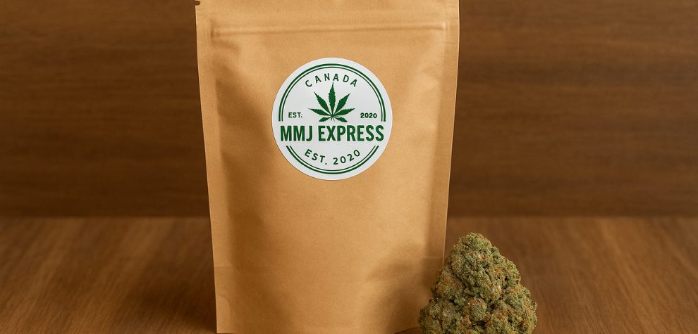 Sealed brown cannabis pouch labeled "MMJ Express" beside a dense cannabis bud on a wooden surface, promoting premium cannabis products