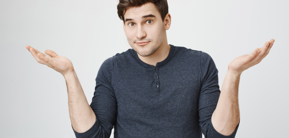 Confused man shrugging with raised hands, symbolizing curiosity or uncertainty about why Canadians prefer to buy Sativa weed online